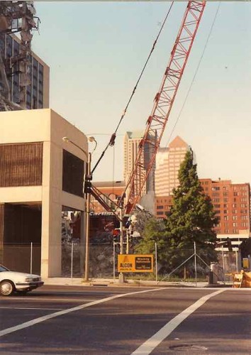 Demolition of the decade-old Sheraton Hotel to make room for the new football stadium. July 1992 --- looking South from Cole & 7th