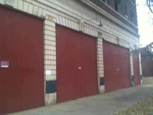 Boarded storefronts at sidewalk level  