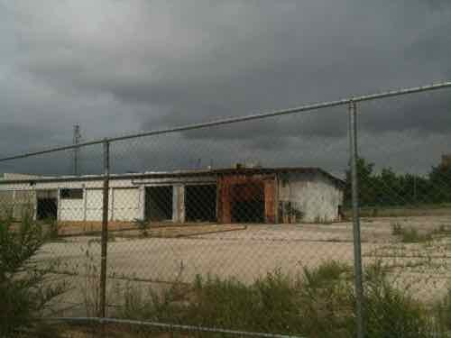 ABOVE: the burned out structure remains