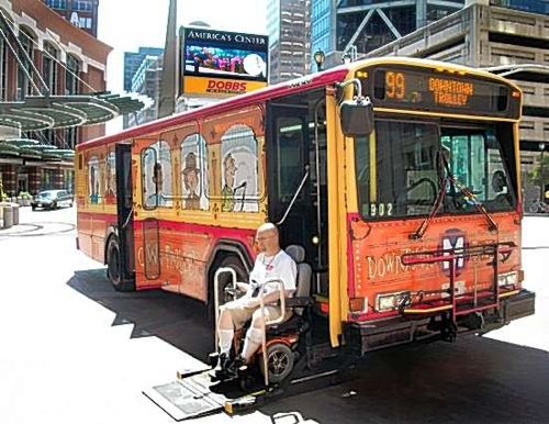 Me leaving the #99 Downtown Trolley after the first ride on July 6, 2010. This replaced the #99 Downtown Circulator that used non-wrapped buses. Photo by Jim Merkel, Suburban Journals