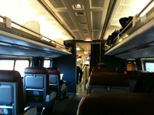 ABOVE: Business class on the return trip had much more room, leather seats and softer lighting