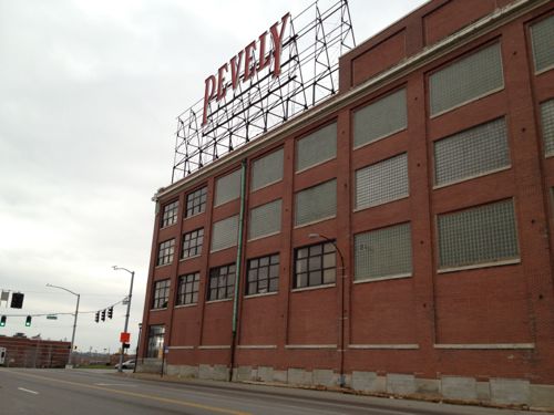 2011: The historic Pevely Dairy maintains the building line at both Grand & Chouteau