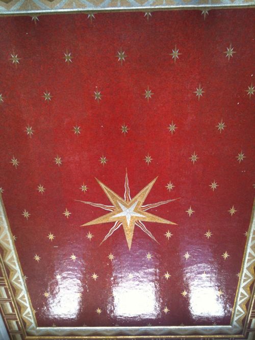 The mosaic tile ceiling in the center is impressive