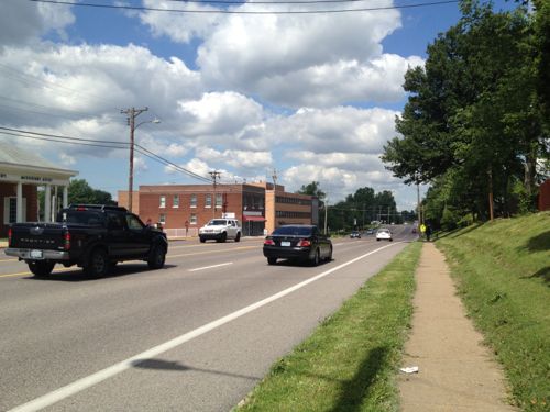 Continuing WB in 2012, sidewalks were narrow. There was no accessible connection to adjacent residential neighborhoods on the right 