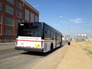 ABOVE: The westbound #32 MetroBus on Chouteau just barely west of Grand. The Pevely bldg is to the left, for now.