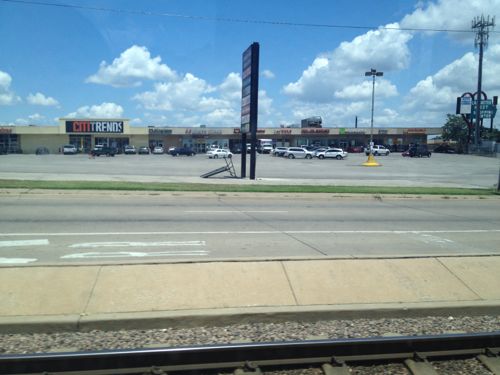 ABOVE: One of several auto-centric strip shopping centers along the Blue line