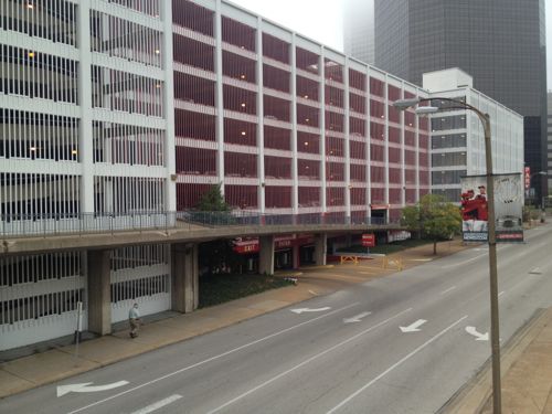 ABOVE: The 8th Street face of the Stadium West garage. The pedestrian ramp to the street crossing isn't ADA-compliant, Stadium East doesn't have a similar ramp.  