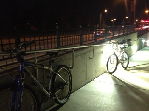 ABOVE: Bicycles secured to the handrail of the Skinker MetroLink ramp on the Washington University campus