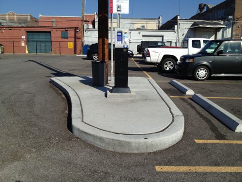 ABOVE: However, those disabled drivers that use a wheelchair are unable to reach the payment machine because no ramp up was provided.  