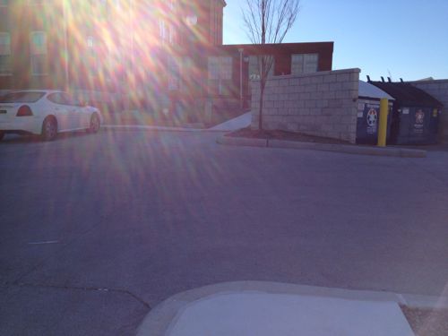 ABOVE: Pedestrians entering from the pedestrian entry off Cote Brilliante don't have a direct path, a curb is a barrier.