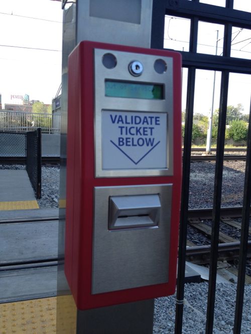 ABOVE: Red validation machines exist at entrances to all MetroLink stations/platforms