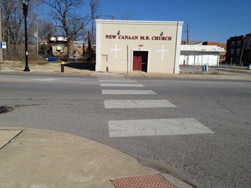 ABOVE: The nearest place to cross MLK is the west side of Clara Ave that runs next to the gas station. Arlington Grove can be seen in the far right. 