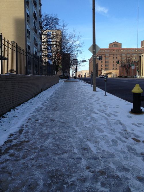 ABOiVE: Our recent light snow made this stretch of sidewalk along Olive nearly impassable. 