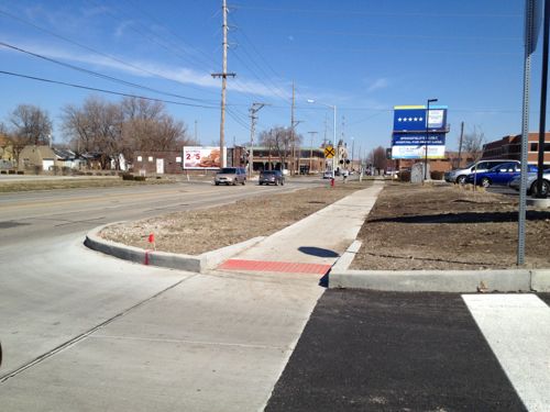 Looking east on Carpenter St from the County Market auto driveway