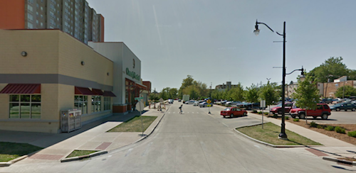 The main entrance in Champaign fronts onto another street with the parking lot on the opposite side.