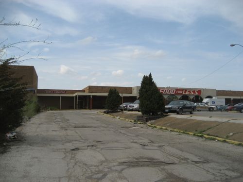 When I visited the site in March 2007 the mall had been closed for over a decade but the attached grocery store remained open during the demolition process.