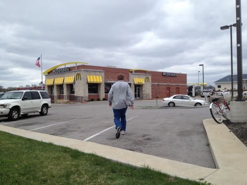 Pedestrians heading to McDonald's (customers & employees) but go over curbs, through grass and navigate cars. Wheelchair users must use the auto entrances/exits. 