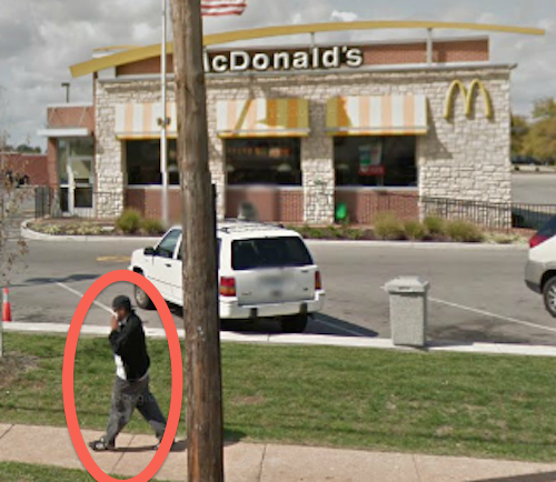 Pedestrian in front of McDonald's