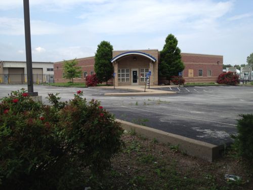 A former BarnesCare building built in 2001, is now vacant. With no pedestrian access and large setbacks from both MLK & 14th this building should be razed and a new urban building constructed on the site.