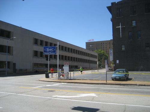 The parking lot at 14th & Locust is privately owned, a good candidate for new construction.  