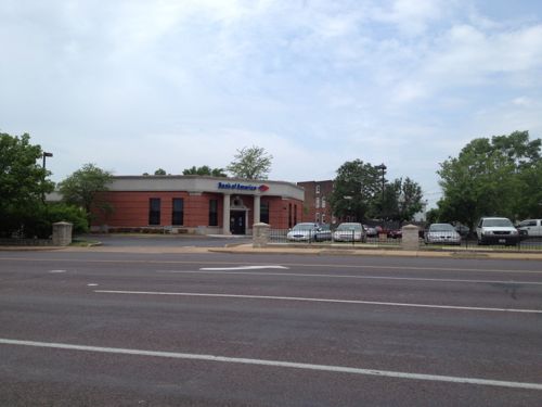 This bank was built in 1993 after the urban bank at the corner of N. Florissant & St. Louis Ave was razed, despite neighborhood objections. This should be replaced with an urban building on the corner. 