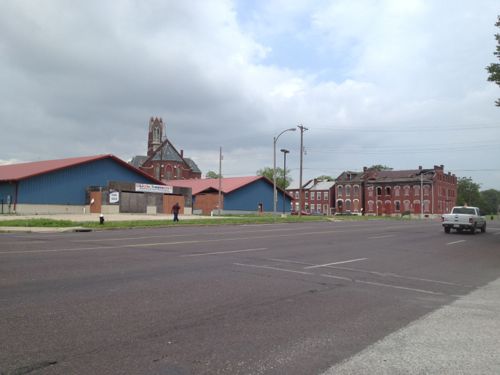 A bank in Illinois owns the unfinished daycare at 1501 Clinton & 1500 Monroe. The buildings to the north are owned by several owners, including the LRA & Northside Regeneration. 