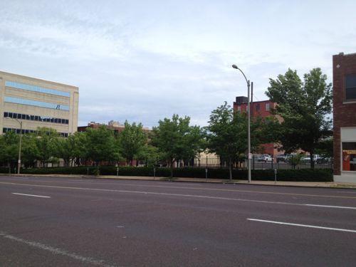 The surface parking lot between the Currency Exchange and 19th Street belongs to the police, came with the building that'll be the new HQ next year. This reduces development potential unless they can get by with the parking in the building. 