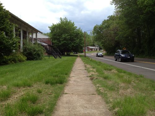 As Murdoch Cut-Off approaches Murdoch a sidewalk does exist.