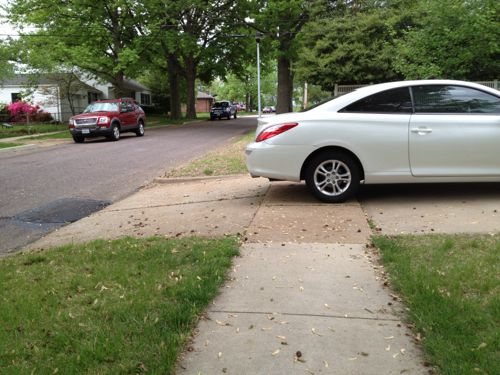 That doesn't mean the sidewalks weren't blocked  at times. This owner had more room on their driveway before their garage door, more than enough to keep the sidewalk clear.