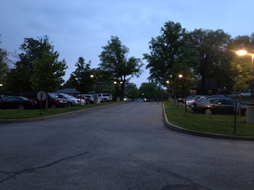 Leaving at night via the auto driveway. I'd imagine many neighbors drive here from just blocks  away because that's the message the design suggests. 