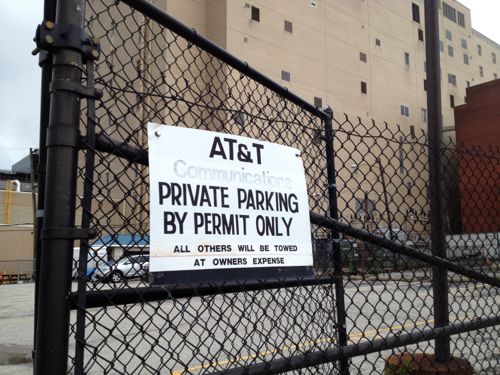 AT&T owns much of the block on both sides of Locust, used for parking.