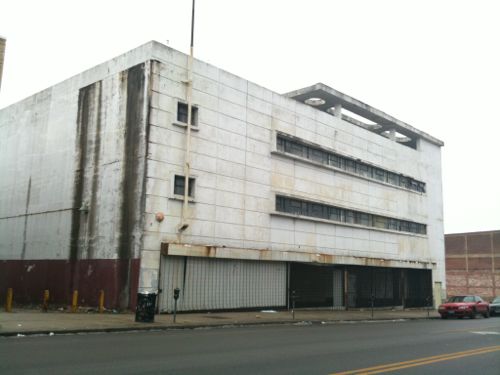 The former JC Penny store built in 1949 on MLK in the Wellston Loop in the modern style with an urban form, rather than style of its red brick neighbors that are 20-40 years older.