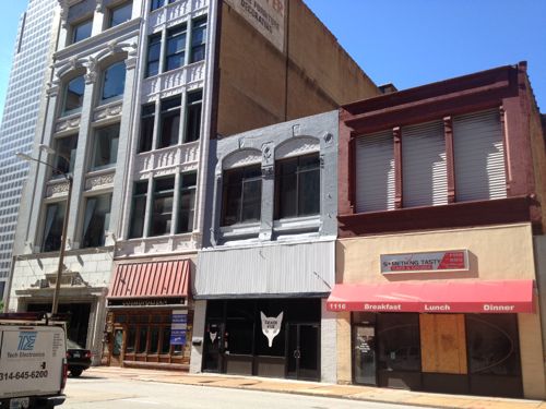 Four buildings remain on the south side of the 11xx block of Olive