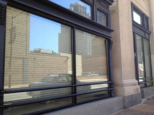 I'd like to see a more interesting use of the ground floor spaces, currently the St. Louis Board of Election Commissioners is behind these blinds. 