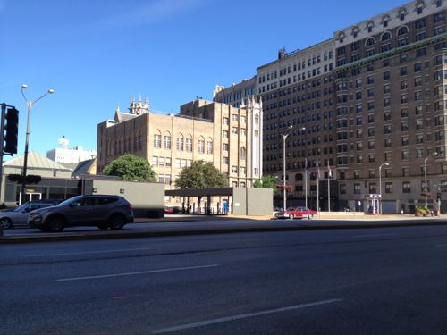Looking back west across Tucker. Infilling the bank site with a building about the height of the Jefferson Arms would be ideal.