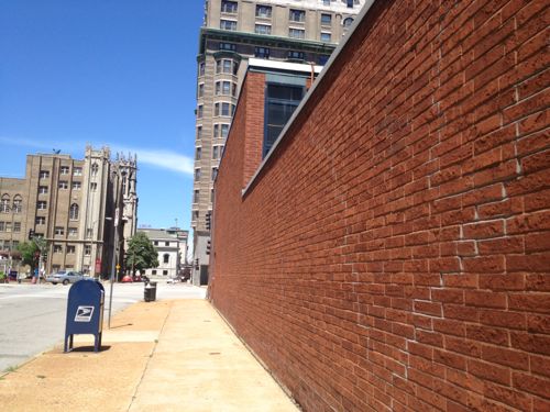 The 1960 building on the NE corner of Tucker & Locust needs to be replaced with a larger structure. 