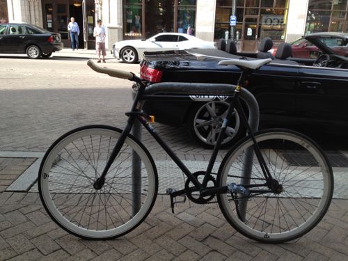 This bike is properly placed next to the Inverted-U rack, the rack helps support the bike. . 