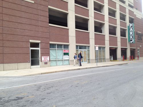 This is a busy sidewalk with many pedestrians going to/from Culinaria located a block south