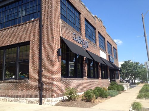 Across the street a similar building was successfully renovated for an independence center and upscale resale store 