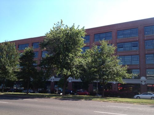 Former Ford plant is now apartments with street-level retail