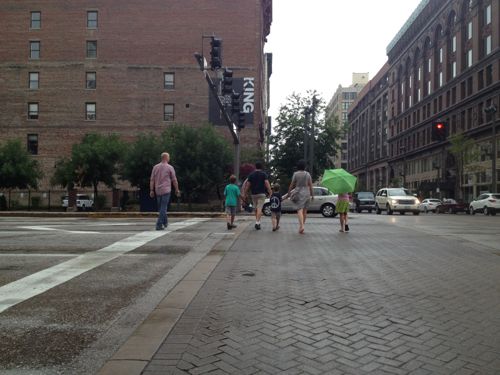 Pedestrians crossing Tucker against traffic at Washington