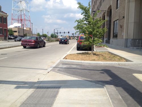 Example of curb bulb behind a parking lane, Tucker & MLK in front of the Post-Dispatch 