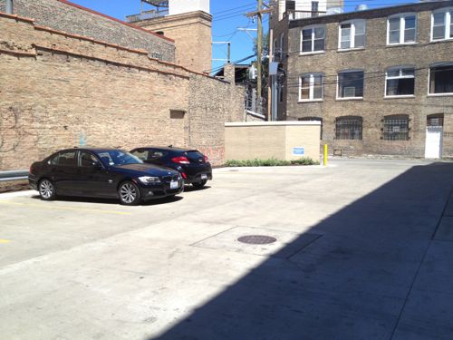 The lot has six regular spaces plus one disabled space, out of view to the left. That's it!