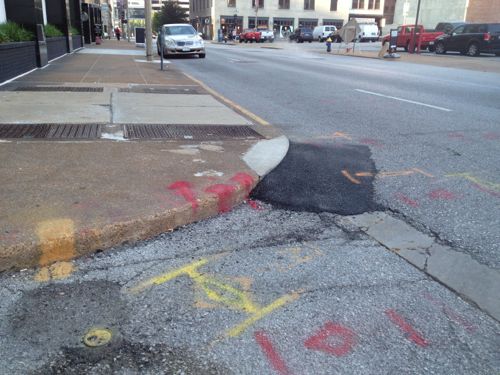 Asphalt was just added at 11th & St. Louis. This intersection has never been ADA compliant, still isn't.