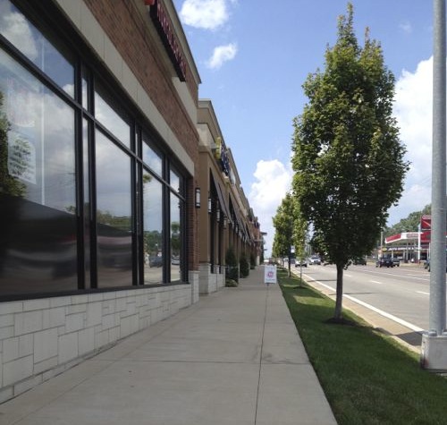 No business has a door onto the Manchester sidewalk, but it is pleasant as a pedestrian and motorists can see businesses as they drive by.  