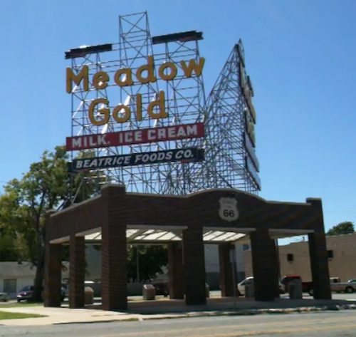 Former Meadow Gold Dairy building was relocated, used as an open-air Route 66 marker.  