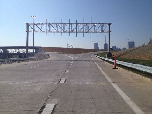 An hour before the off ramp from I-70 to Tucker signs still weren't placed.  Only the right was opened, the left will be for I-70 traffic when the new bridge opens next year