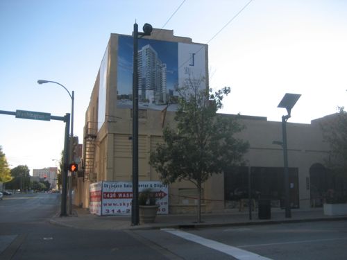 The corner had old buildings when the project was announced. 
