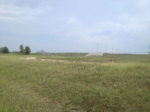 The fence at the end of the rarely used billion dollar runway