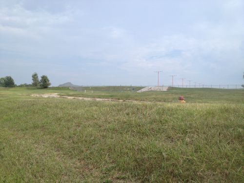 The fence at the end of the rarely used billion dollar runway